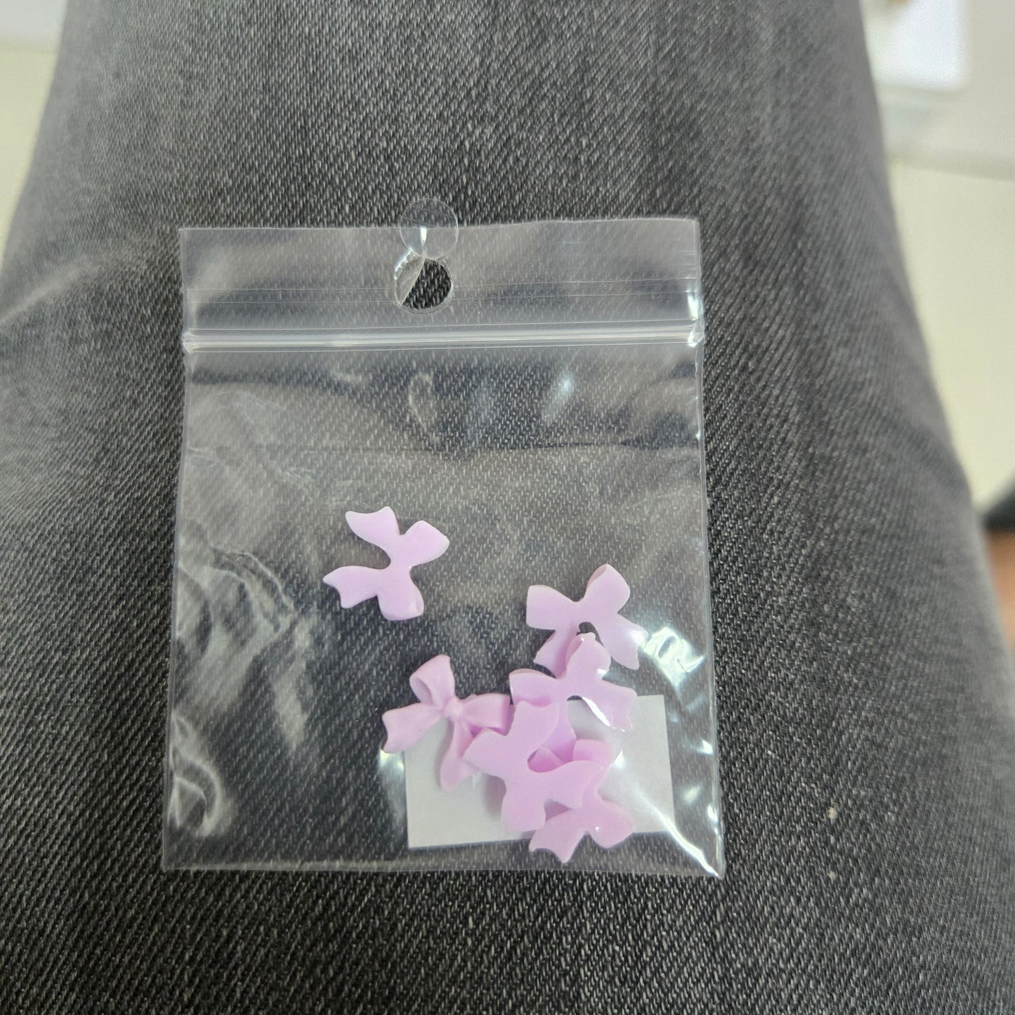 Adornos para uñas con forma de lazo