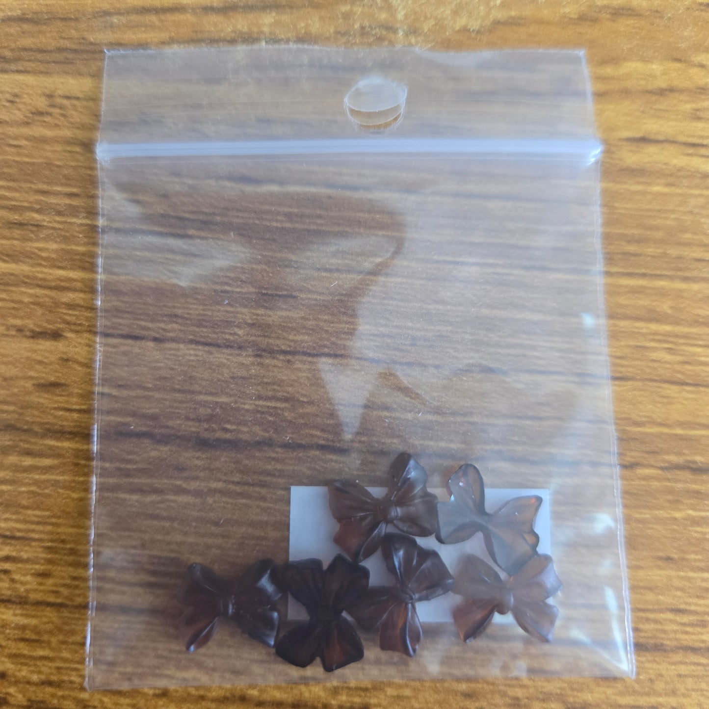 Adornos para uñas con forma de lazo