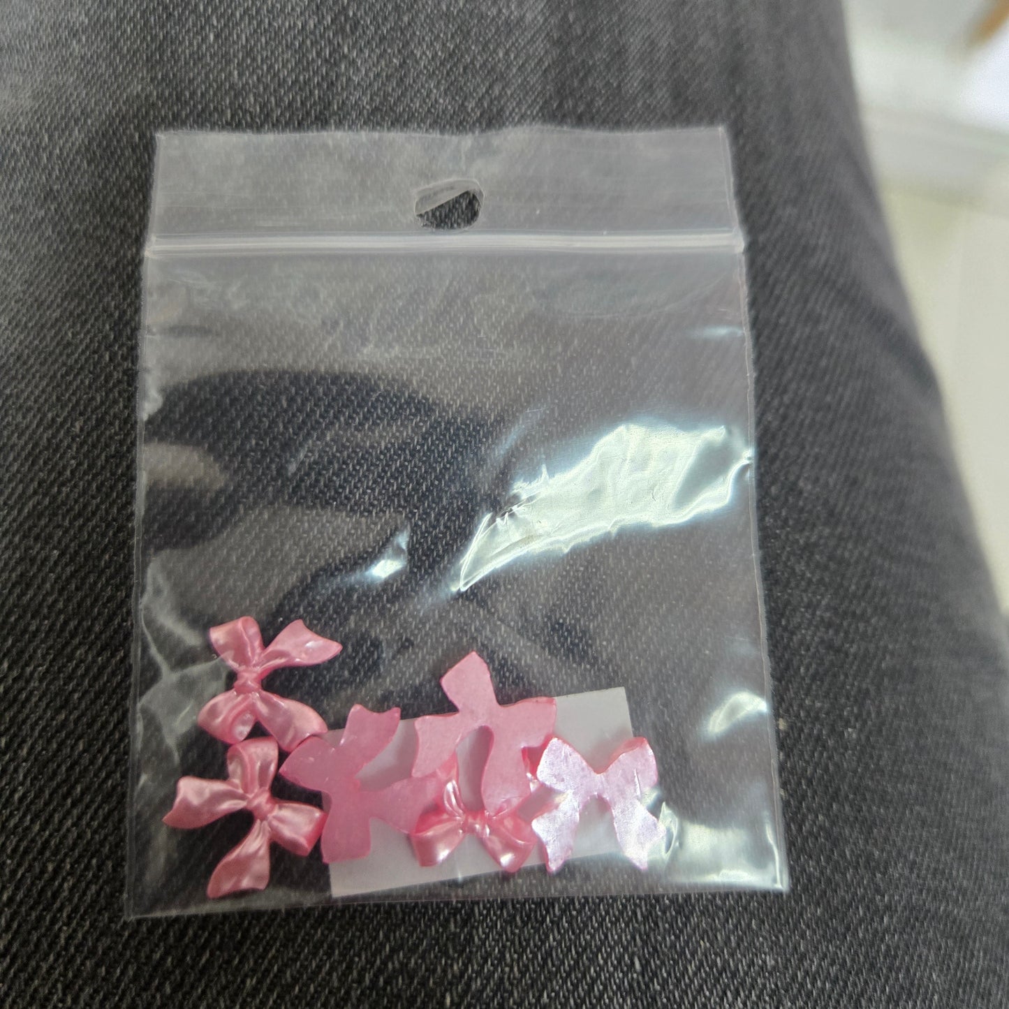 Adornos para uñas con forma de lazo