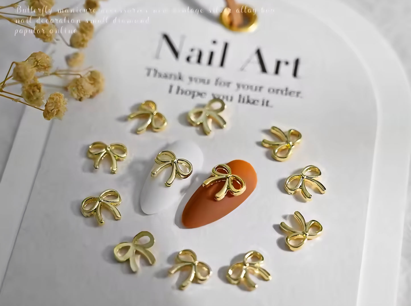 Adornos para uñas con forma de lazo